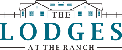 Logo with an illustrated lodge and text: The Lodges at The Ranch in teal and black.
