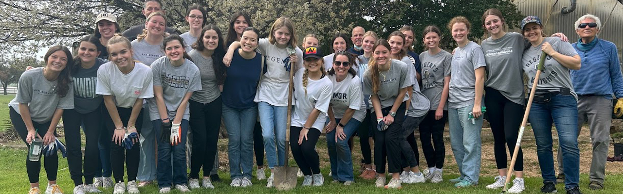 A group of Marbridge volunteers standing next to each other in a group.